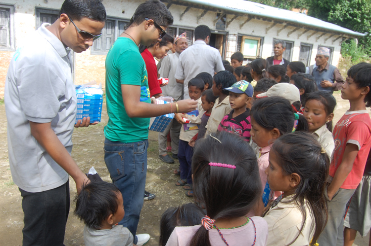 8_Pax team distributing soaps and toothpastes