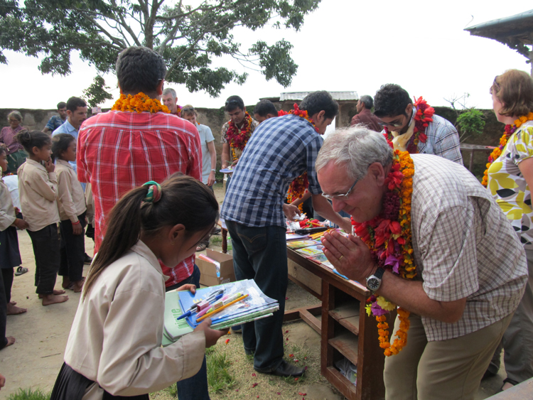 5_A student of Shree Raktakali School receiving the stationery from a British friend